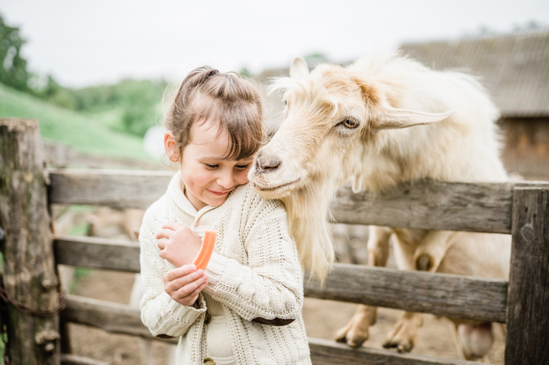 girl and goat